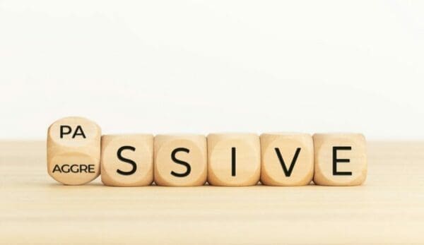 Passive Aggressive spelled with wooden cubes