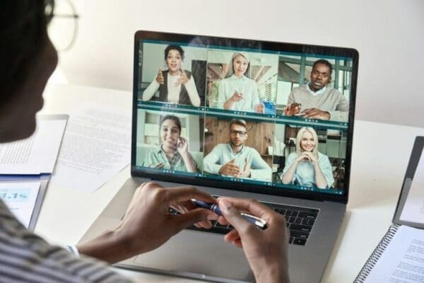 Female manager having virtual meeting with diverse business team