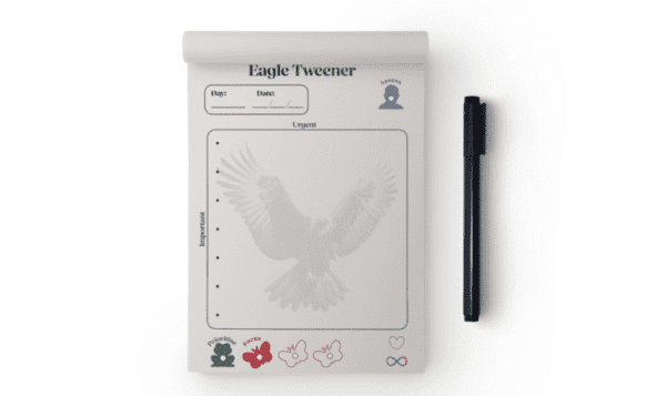 Be Your Eagle Travel notepad next to a black pen