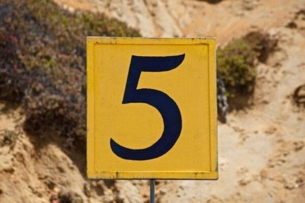 Number five on a yellow sign