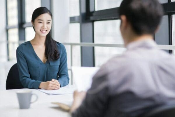 A lady interviewing at a recruitment agency