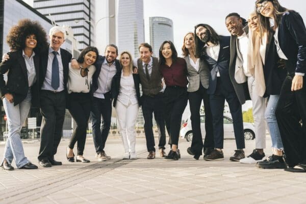 Group of work employees smilling from a good company culture