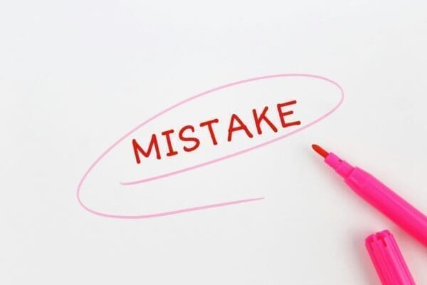 mistake written with red marker on white paper