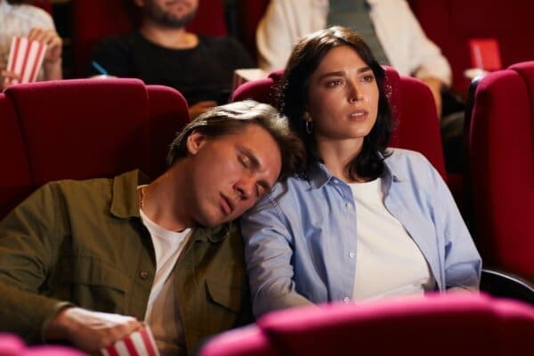 Bored Man Falling Asleep in Cinema