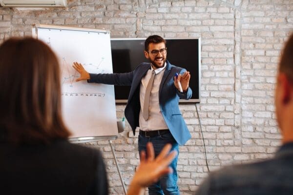 Business man making a presentation at office after soft skills training for effective presentations